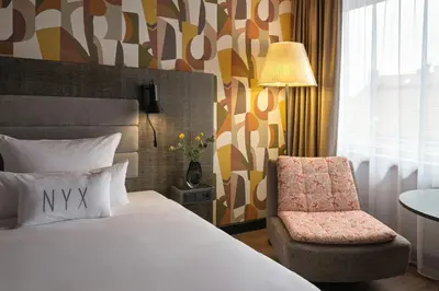 Ein Bett oder Betten in einem Zimmer der Unterkunft NYX Hotel Berlin Köpenick by Leonardo Hotels