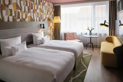 Ein Bett oder Betten in einem Zimmer der Unterkunft NYX Hotel Berlin Köpenick by Leonardo Hotels