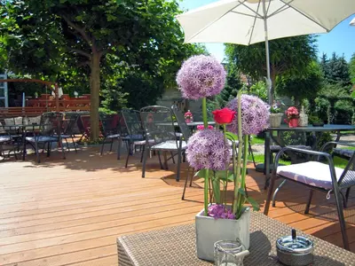 Ein Garten an der Unterkunft Gut Hotel Stadt Beelitz