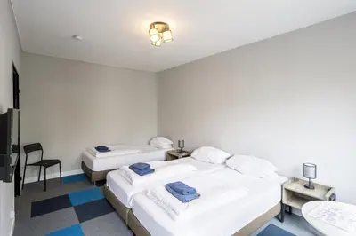 Ein Bett oder Betten in einem Zimmer der Unterkunft icke.apartments