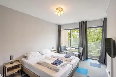 Ein Bett oder Betten in einem Zimmer der Unterkunft icke.apartments