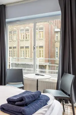 Ein Bett oder Betten in einem Zimmer der Unterkunft icke.apartments