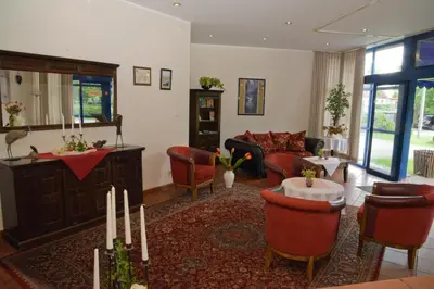 Ein Sitzbereich in der Unterkunft Hotel Brandenburger Hof
