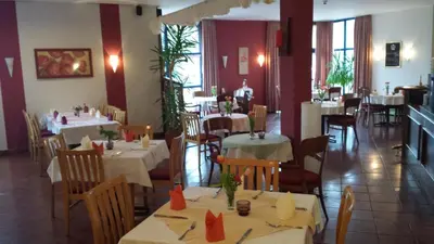 Ein Restaurant oder anderes Speiselokal in der Unterkunft Hotel Brandenburger Hof