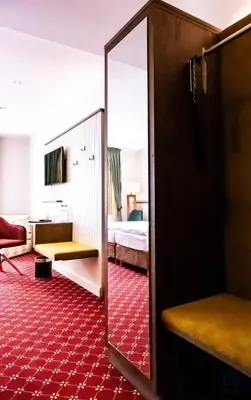 Ein Bett oder Betten in einem Zimmer der Unterkunft Hotel Fliegerheim