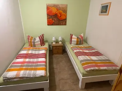 Ein Bett oder Betten in einem Zimmer der Unterkunft Ferienwohnung 