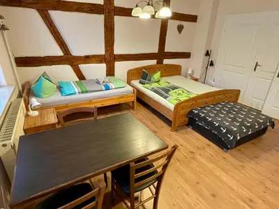 Ein Bett oder Betten in einem Zimmer der Unterkunft Ferienwohnung 