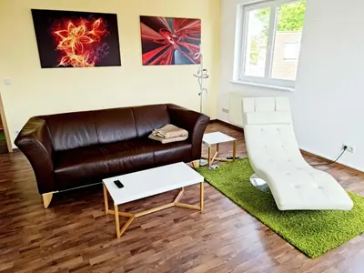 Ein Sitzbereich in der Unterkunft KARINO helles Apartment über den Havel-Gärten auf der Dominsel