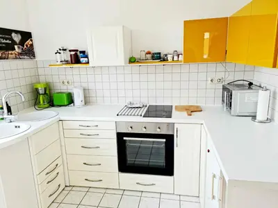 Küche/Küchenzeile in der Unterkunft KARINO helles Apartment über den Havel-Gärten auf der Dominsel