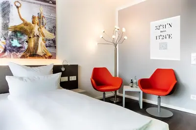 Ein Bett oder Betten in einem Zimmer der Unterkunft Hotel Carolinenhof