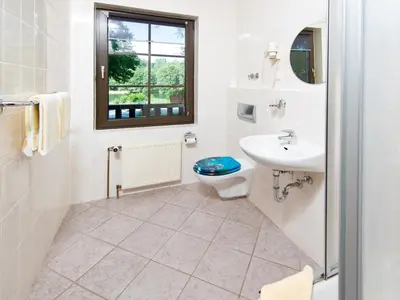 Ein Badezimmer in der Unterkunft Seeschloß