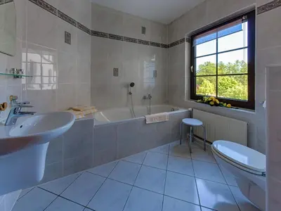 Ein Badezimmer in der Unterkunft Seeschloß