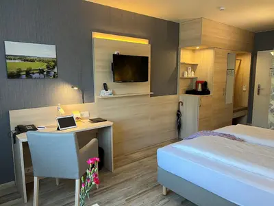 Ein Bett oder Betten in einem Zimmer der Unterkunft Landhotel Felchow