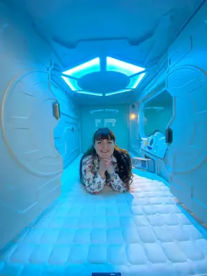 Ein Bett oder Betten in einem Zimmer der Unterkunft Space Night Capsule Hostel