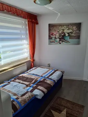 Ein Bett oder Betten in einem Zimmer der Unterkunft Ferienhaus Mandy