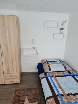 Ein Bett oder Betten in einem Zimmer der Unterkunft Ferienhaus Mandy