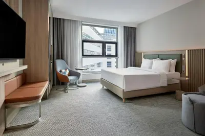 Ein Bett oder Betten in einem Zimmer der Unterkunft Courtyard by Marriott Berlin City Center