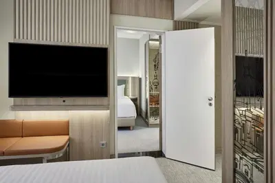 Ein Bett oder Betten in einem Zimmer der Unterkunft Courtyard by Marriott Berlin City Center