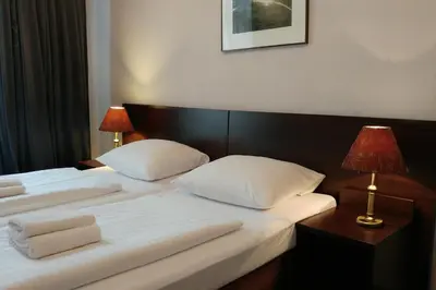 Ein Bett oder Betten in einem Zimmer der Unterkunft Hotel Xantener Eck