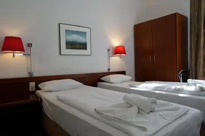 Ein Bett oder Betten in einem Zimmer der Unterkunft Hotel Xantener Eck