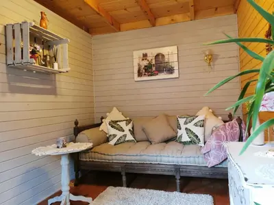 Ein Sitzbereich in der Unterkunft Ferienhaus mit mediterraner Terrasse