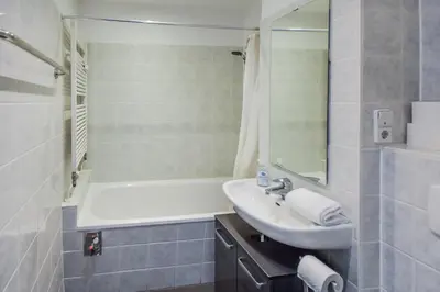Ein Badezimmer in der Unterkunft Apartment Centro