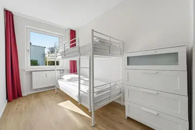 Ein Bett oder Betten in einem Zimmer der Unterkunft Apartment East Side
