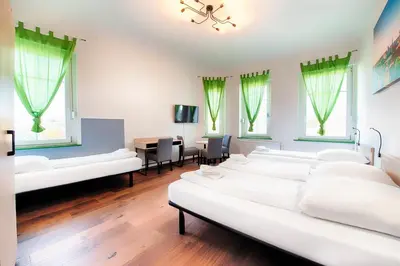 Ein Bett oder Betten in einem Zimmer der Unterkunft Hotel B1