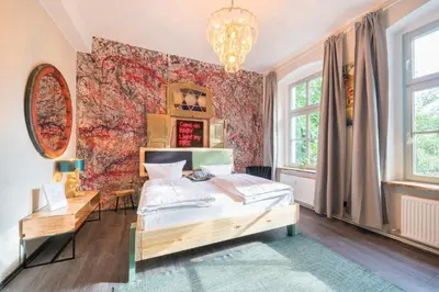 Ein Bett oder Betten in einem Zimmer der Unterkunft Design Apartments - 