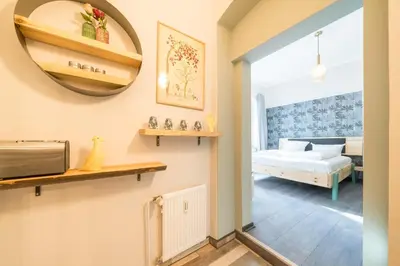 Ein Bett oder Betten in einem Zimmer der Unterkunft Design Apartments - 