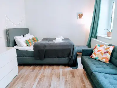 Ein Sitzbereich in der Unterkunft Central 2 bedroom flat for families & calm guests