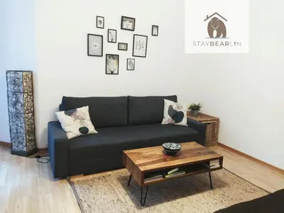 Ein Sitzbereich in der Unterkunft Quiet studio apartment in Prenzlauer Berg near Mauerpark