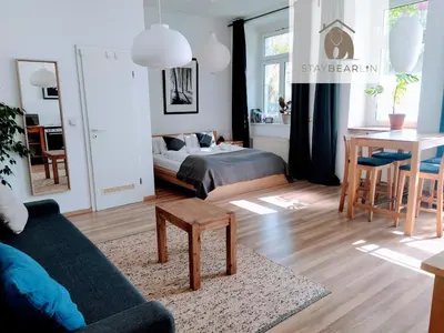 Ein Bett oder Betten in einem Zimmer der Unterkunft StayBearlin Apartments Prenzlauer Berg Grellstraße
