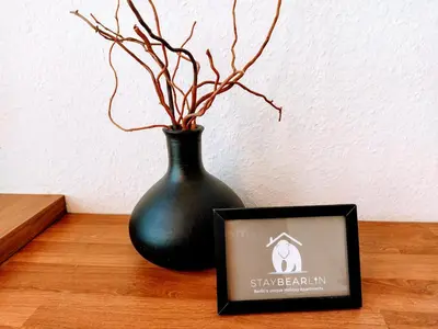 Ein Zertifikat, Auszeichnung, Logo oder anderes Dokument, das in der Unterkunft StayBearlin Apartments Prenzlauer Berg Grellstraße ausgestellt ist