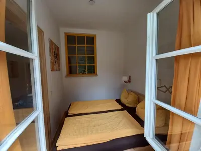 Ein Bett oder Betten in einem Zimmer der Unterkunft FeWo 