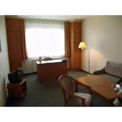 Ein Sitzbereich in der Unterkunft Hotel Kubrat an der Spree