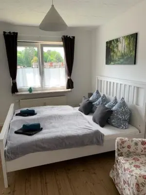 Ein Bett oder Betten in einem Zimmer der Unterkunft Ferienappartement am See III