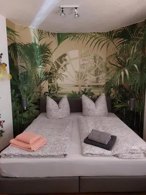 Ein Bett oder Betten in einem Zimmer der Unterkunft Apartment Blütenstadt Werder im Souterraine