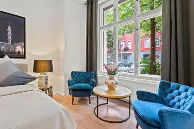 Ein Bett oder Betten in einem Zimmer der Unterkunft The Weichsel - Group Flat in Central Berlin, Family-Friendly, 3BR, 2 bath rooms, 4- 6 Guests