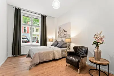 Ein Bett oder Betten in einem Zimmer der Unterkunft The Weichsel - Group Flat in Central Berlin, Family-Friendly, 3BR, 2 bath rooms, 4- 6 Guests