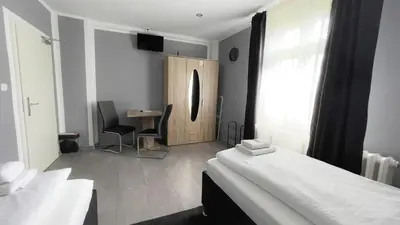 Ein Bett oder Betten in einem Zimmer der Unterkunft Motel Daria