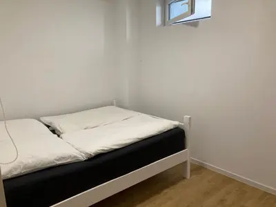 Ein Bett oder Betten in einem Zimmer der Unterkunft Ferienwohnung Green Garden Berlin