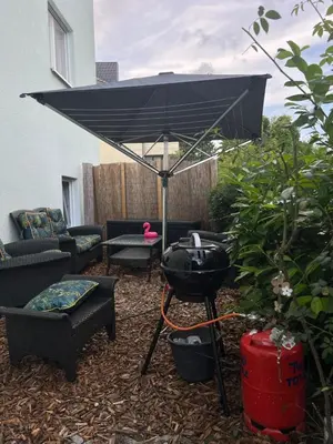 Ein Sitzbereich in der Unterkunft Ferienwohnung Green Garden Berlin