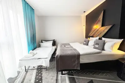 Ein Bett oder Betten in einem Zimmer der Unterkunft Holiday Inn - the niu, Flash Berlin Charlottenburg by IHG