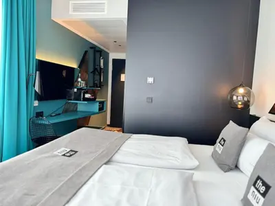 Ein Bett oder Betten in einem Zimmer der Unterkunft Holiday Inn - the niu, Flash Berlin Charlottenburg by IHG