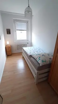 Ein Bett oder Betten in einem Zimmer der Unterkunft Sybel