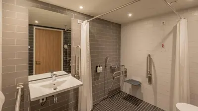 Ein Badezimmer in der Unterkunft Holiday Inn Express & Suites - Potsdam by IHG