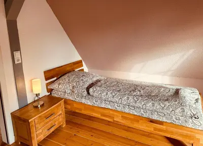 Ein Bett oder Betten in einem Zimmer der Unterkunft Gemütliches Haus im grünen in NFO