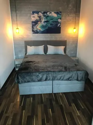 Ein Bett oder Betten in einem Zimmer der Unterkunft Modernes wohnen im alten Beelitz Wohnung 2