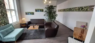 Ein Sitzbereich in der Unterkunft Modernes wohnen im alten Beelitz Wohnung 2